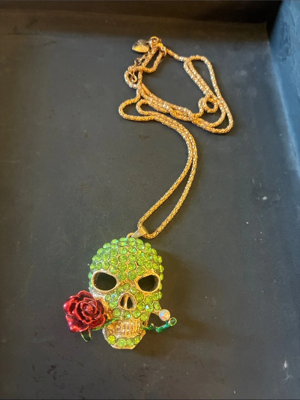 Green Crystal Skull Pendant Necklace with Red Rose Accent